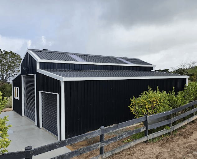 Blue and white barn