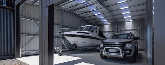Boat and vehicle in shed - Wide Span Sheds