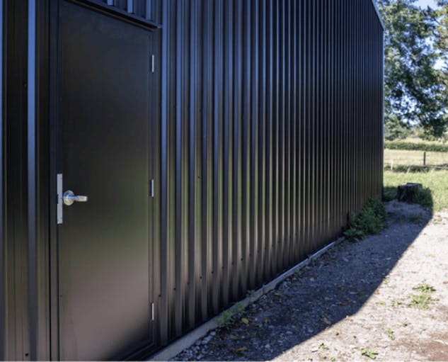 COLORSTEEL PA door and cladding - Wide Span Sheds