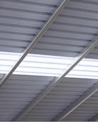 Steel cladding roof with skylights