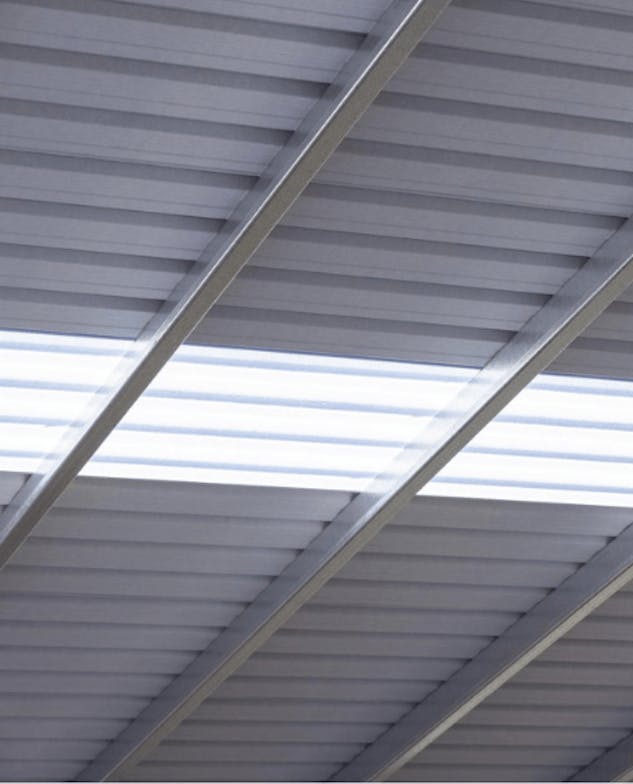 Steel cladding roof with skylights
