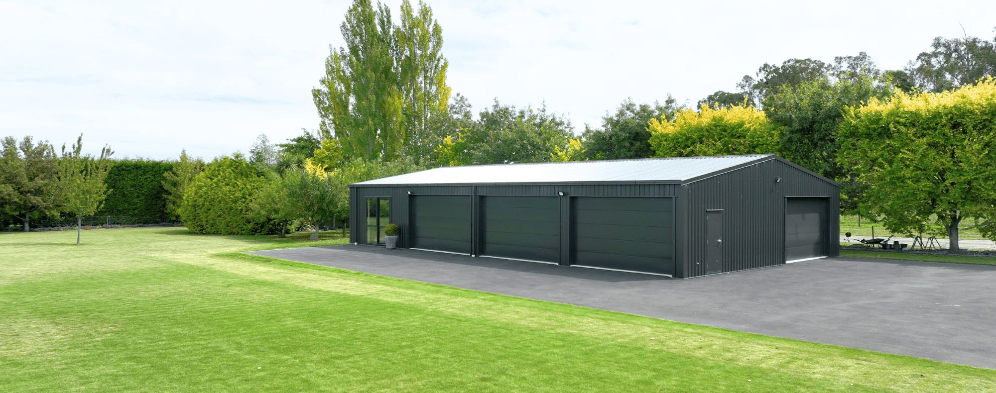 Garage with green grass outside Garage with green grass outside