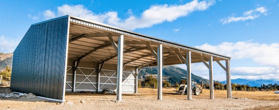 Open bay tractor and farm shed
