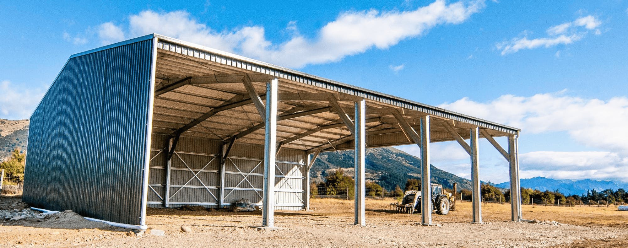 Open bay tractor and farm shed