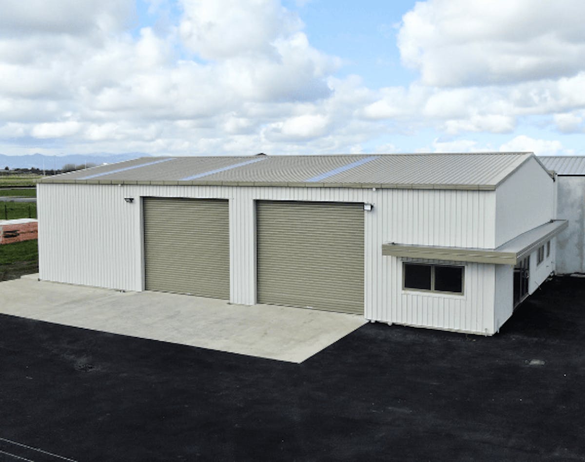 Light coloured steel building - Wide Span Sheds