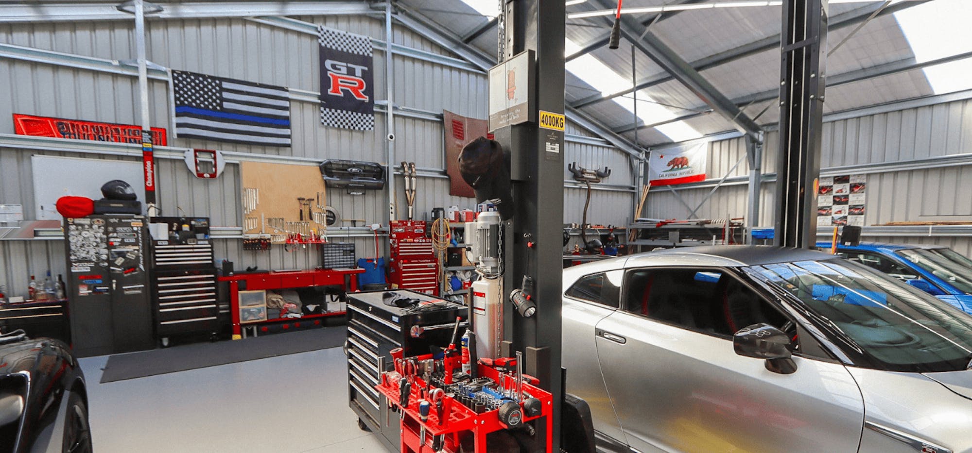 Car collectors steel shed interior - Wide Span Sheds design