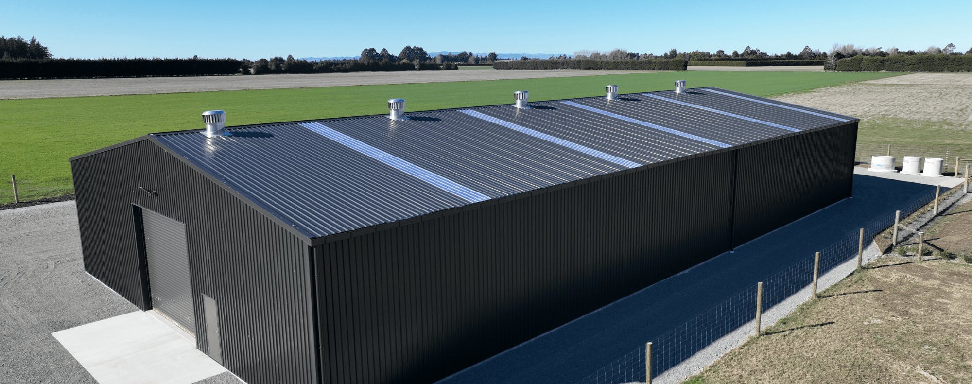 Large industrial rural contractors shed - Wide Span Sheds design