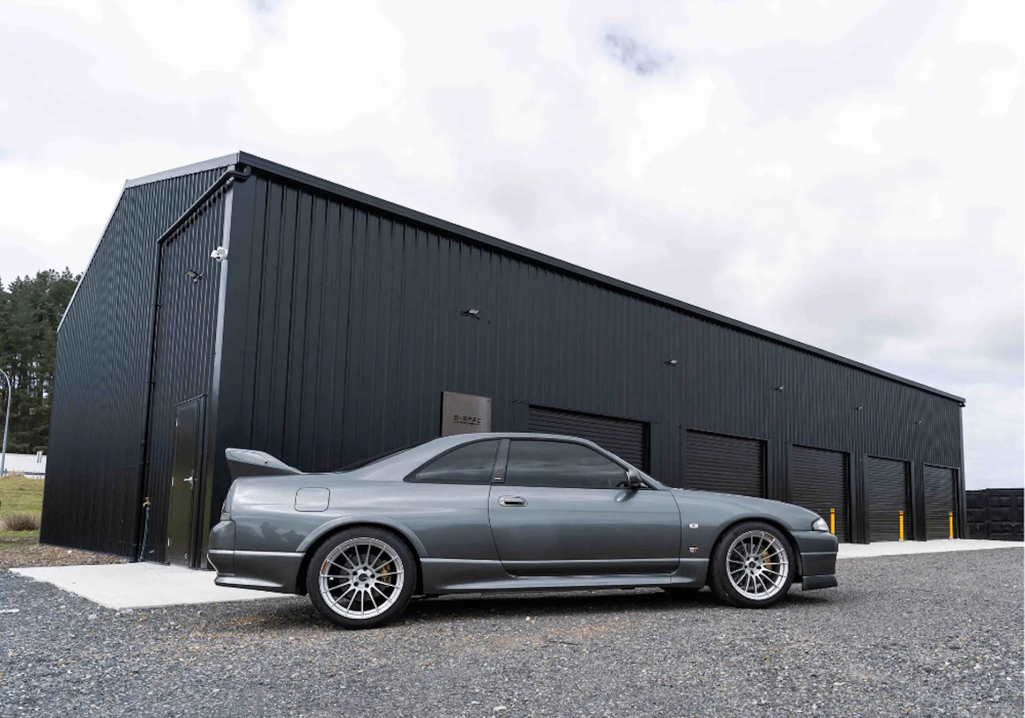 1.-NZ-Imagery Inspo-Gallery Meremere-Drift-Park industrial-shed-with-car-outside