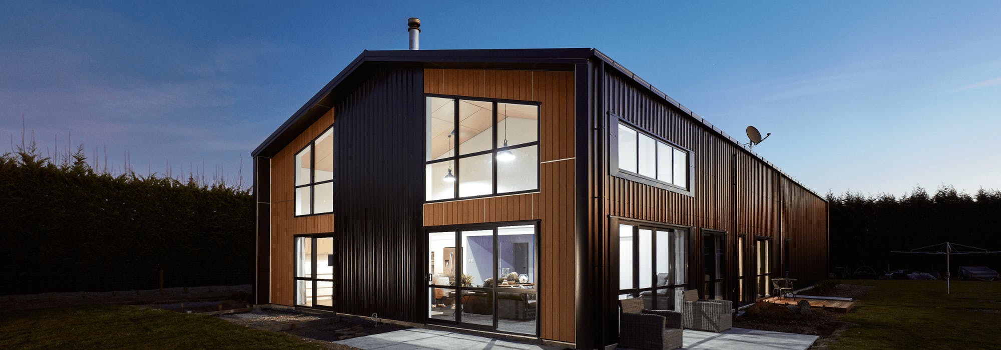 Rosendale Shed Home - Exterior view with lighting at night