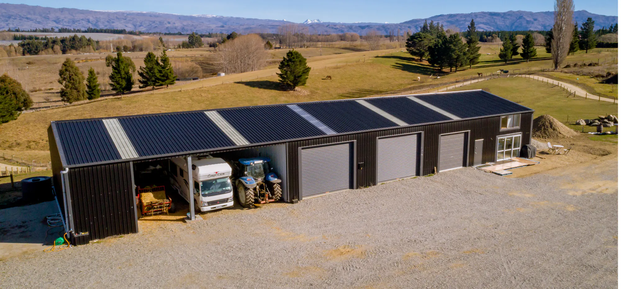 1.-NZ-Imagery Inspo-Gallery The-Shed-That-Ticks-Every-Box--Central-Otago 7-bay-shed-aerial-left-view