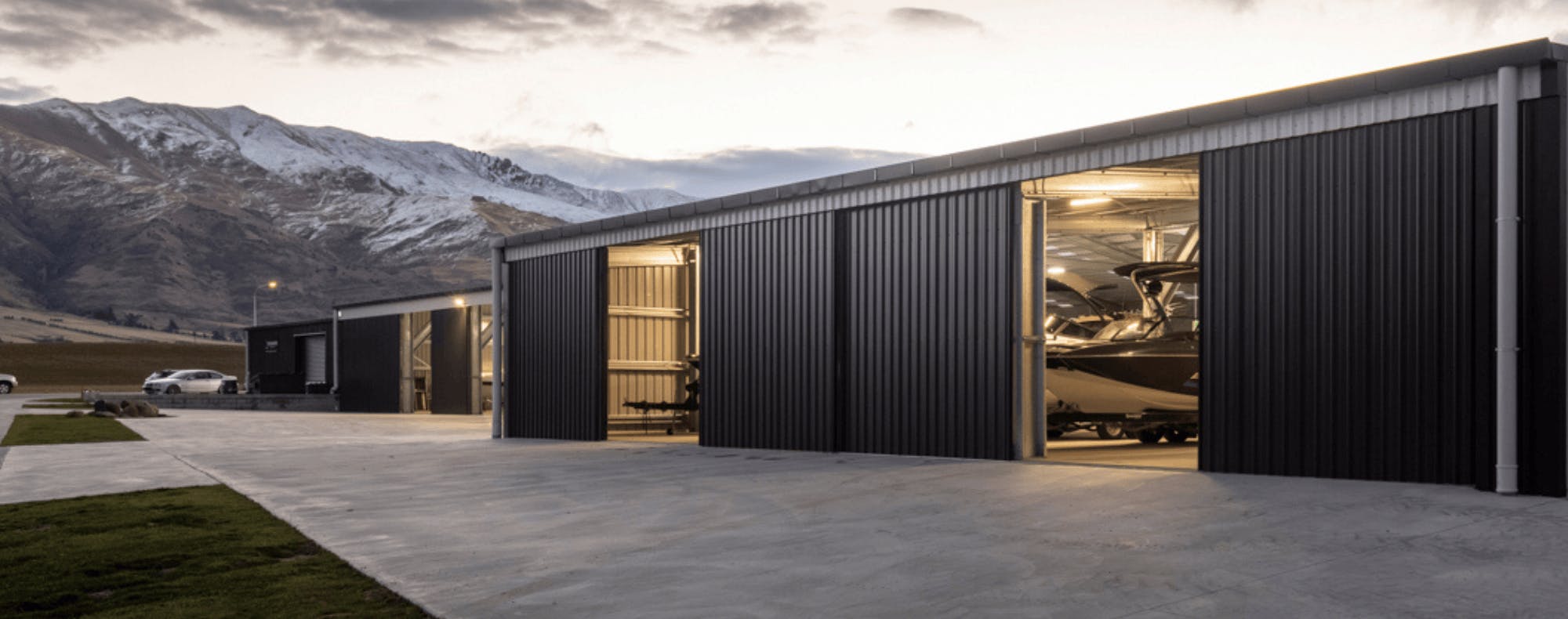 Wanaka Boat Shed - Mountains in background and interior lighting