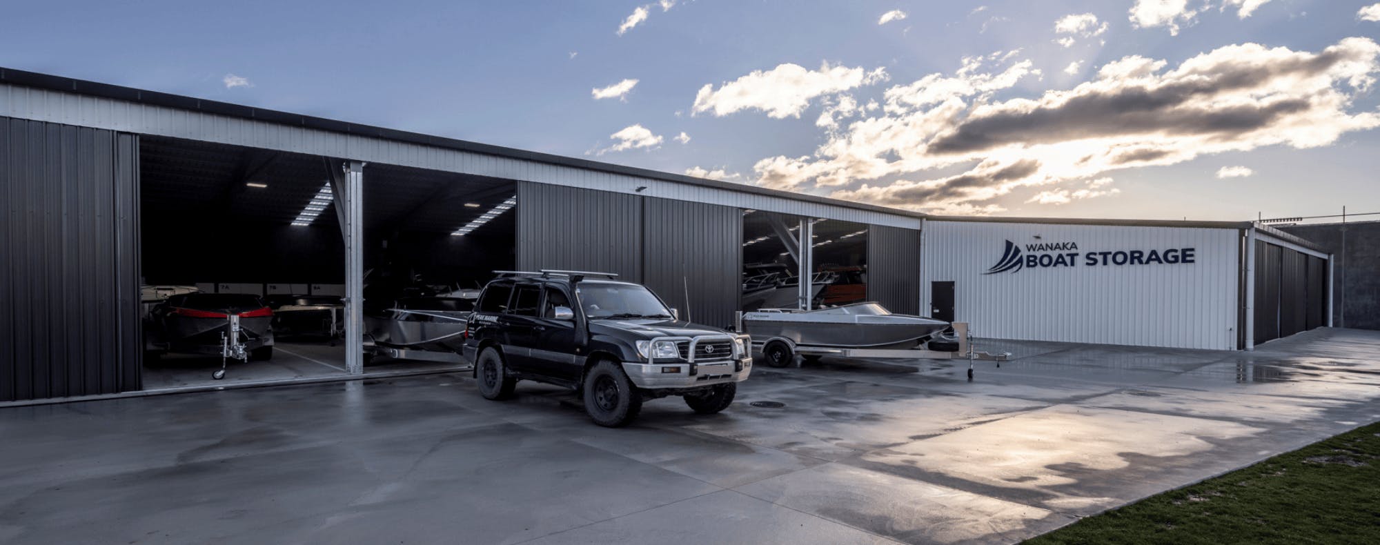 Wanaka Boat Shed - Storage Shed - Open bays and vehicle outside Wanaka Boat Shed - Storage Shed - Open bays and vehicle outside