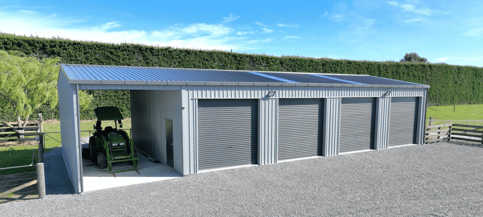 10x20 shed exterior front with tractor - Wide Span Sheds