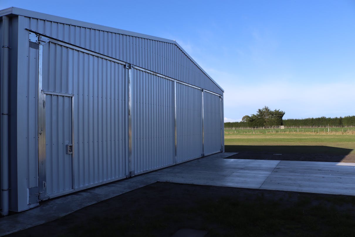 20x20 steel shed on a blue sky day - Wide Span Sheds 20x20 steel shed on a blue sky day - Wide Span Sheds