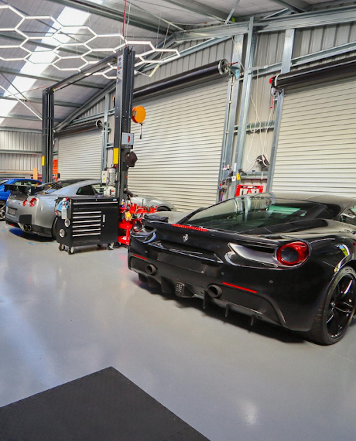 Car hoist workshop and garage